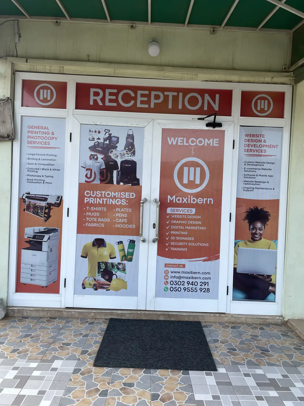 Maxibern reception entrance with printed service displays